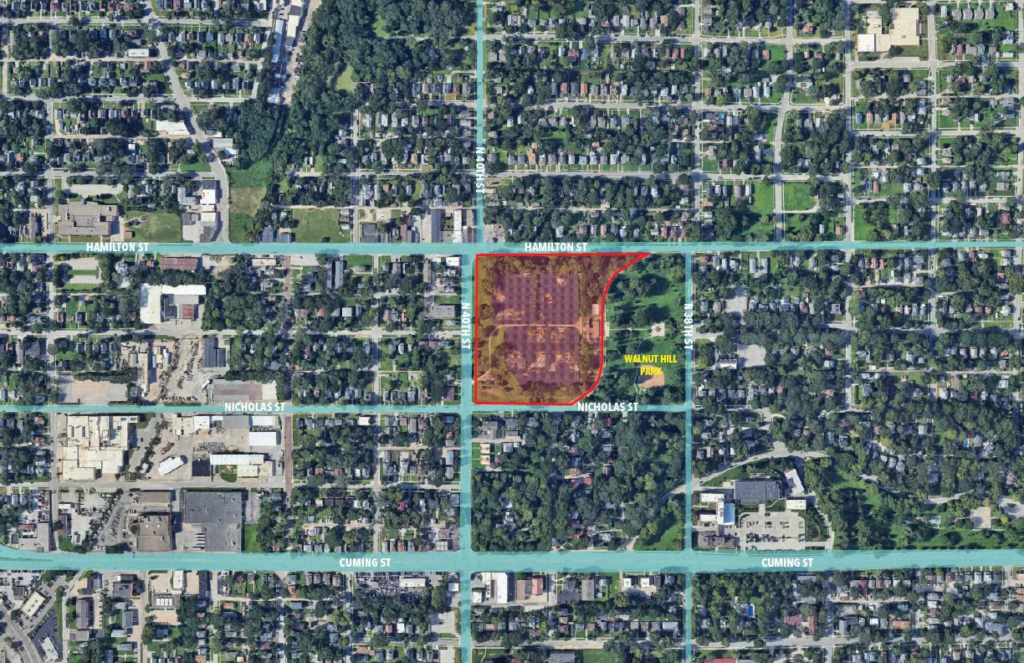 Aerial map with a site outlined in red at the southeast corner of North 40th and Hamilton streets in Omaha, next to Walnut Hill Park.